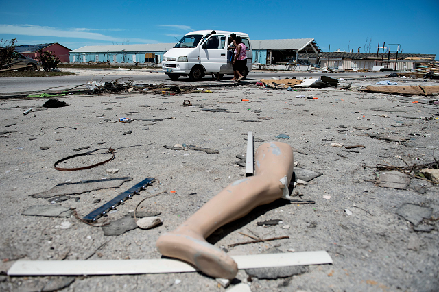the leg of a dismantled mannequin is seen next to damage caused by hurricane dorian on september 5 2019 in marsh harbour great abaco island in the bahamas photo afp the leg of a dismantled mannequin is seen next to damage caused by hurricane dorian on september 5 2019 in marsh harbour great abaco island in the bahamas photo afp