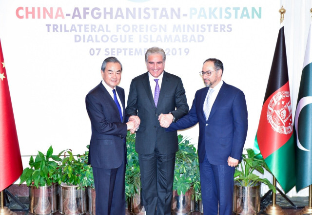 foreign ministers of pakistan china and afghanistan display solidarity at a trilateral summit in islamabad last year photo express file foreign ministers of pakistan china and afghanistan display solidarity at a trilateral summit in islamabad last year photo express file
