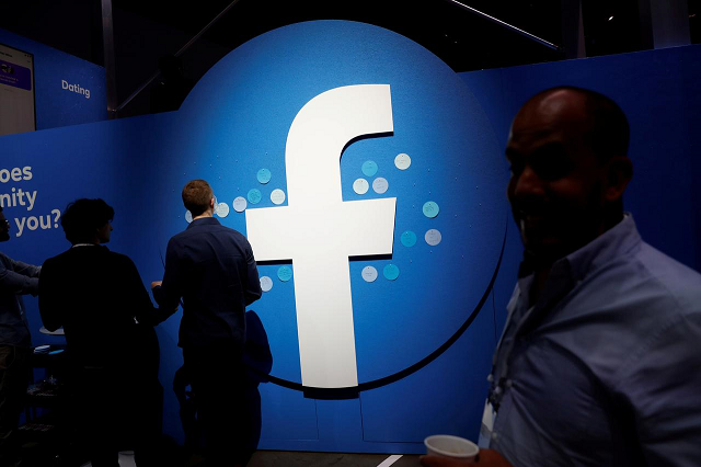 attendees walk past a facebook logo during facebook 039 s f8 developers conference in san jose california us april 30 2019 photo reuters attendees walk past a facebook logo during facebook 039 s f8 developers conference in san jose california us april 30 2019 photo reuters