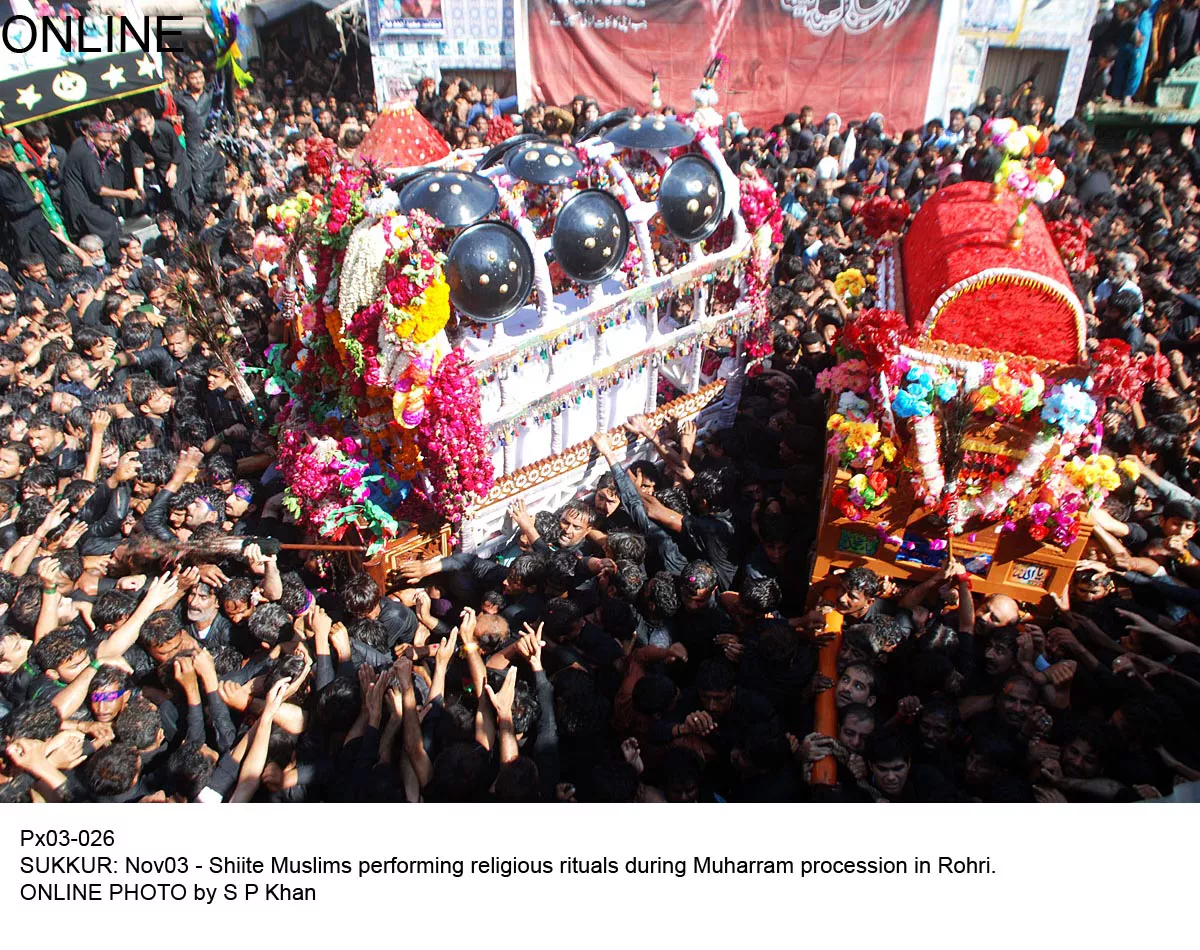 in this file photo mourners carry tazias as they take part in a muharram procession in rohri photo online in this file photo mourners carry tazias as they take part in a muharram procession in rohri photo online