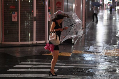 commuter chaos after powerful typhoon hits tokyo commuter chaos after powerful typhoon hits tokyo