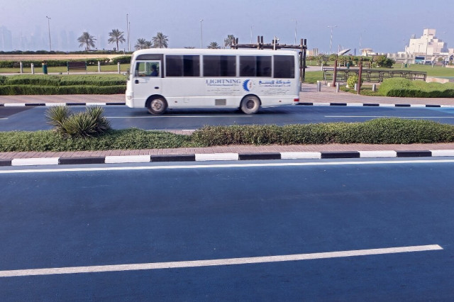 a 200 metre stretch of a downtown thoroughfare leading to the waterfront has been coated with a one millimetre thick blue heat reflective pigment photo courtesy https phys org news 2019 09 blue qatar road azure cool html