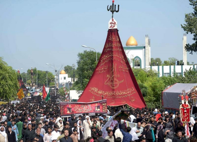 people take part in the mourning procession near sector g 6 imambargah in islamabad photos afp people take part in the mourning procession near sector g 6 imambargah in islamabad photos afp