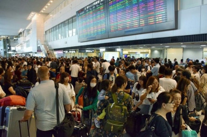 typhoon stranded 17 000 at tokyo airport operator typhoon stranded 17 000 at tokyo airport operator