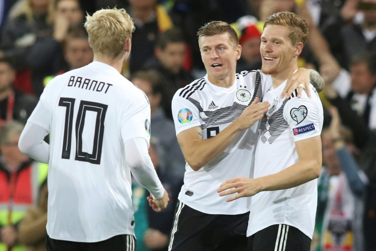 germany came to belfast in need of a win after a bitter 4 2 home defeat by the netherlands in hamburg last friday left them in danger of dropping out of the automatic qualification spots photo afp