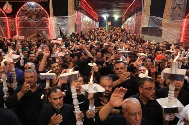 shias muslim men pray at the imam abbas shrine in the holy city of karbala on the eve of ashura on september 9 2019 photo afp shias muslim men pray at the imam abbas shrine in the holy city of karbala on the eve of ashura on september 9 2019 photo afp