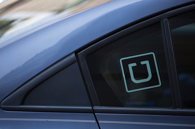 in this file photo taken on july 09 2019 the uber logo is seen on a car in washington dc photo afp