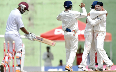 sharma s five for troubles west indies