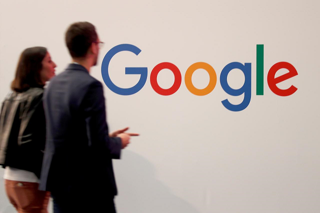 visitors pass by the logo of google at the high profile startups and high tech leaders gathering viva tech in paris france may 16 2019 photo reuters
