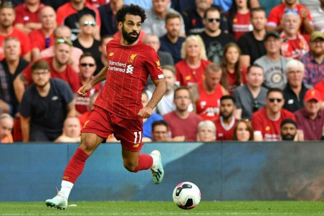 jurgen klopp 039 s side have seized the early initiative in the premier league with four successive wins photo afp jurgen klopp 039 s side have seized the early initiative in the premier league with four successive wins photo afp