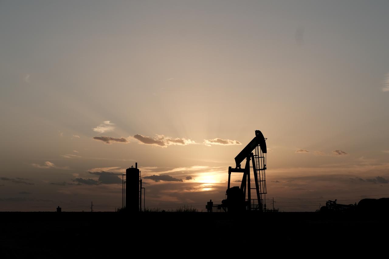 oil holds around 60 as u s  china trade hopes support photo reuters