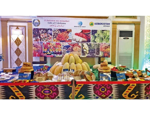 a view of a kiosk displaying fruits from uzbekistan at an event to celebrate uzbekistan s national day photo dna a view of a kiosk displaying fruits from uzbekistan at an event to celebrate uzbekistan s national day photo dna