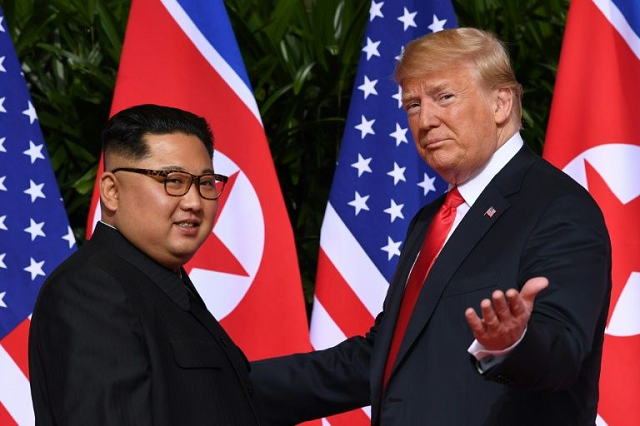 in this file photo taken on june 12 2018 us president donald trump r meets with north korea 039 s leader kim jong un l on sentosa island in singapore photo afp