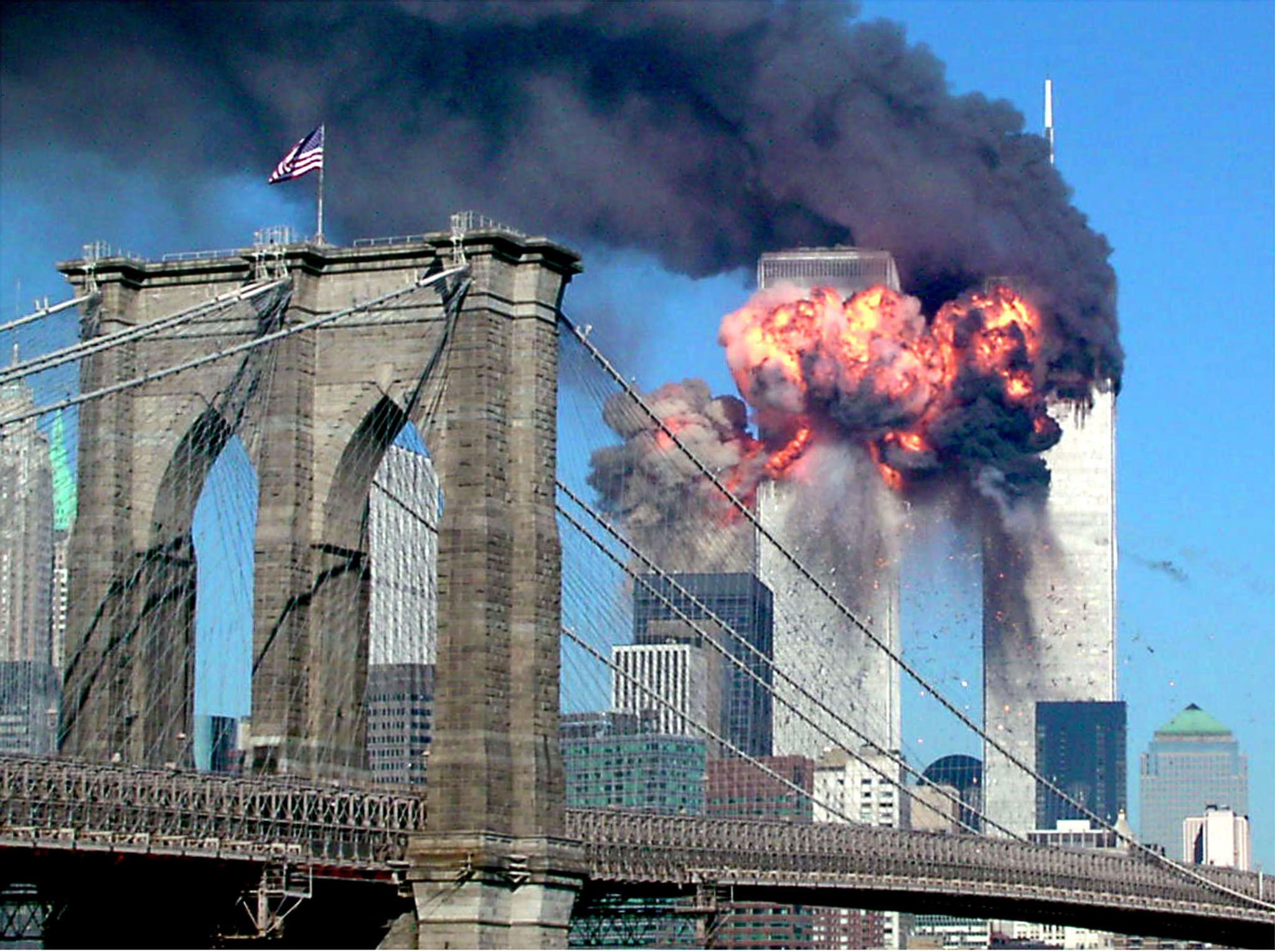 the second tower of the world trade center bursts into flames after being hit by a hijacked airplane in new york in this september 11 2001 file photograph al qaeda leader osama bin laden was killed in a firefight with u s forces in pakistan on may 1 2011 ending a nearly 10 year worldwide hunt for the mastermind of the sept 11 attacks the brooklyn bridge is seen in the foreground reuters sara k schwittek files united states   tags politics civil unrest   rtr2lvzb