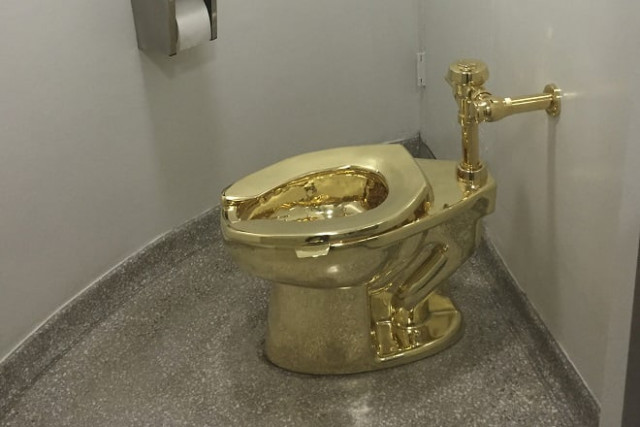 file photo of fully functioning solid gold toilet made by italian artist maurizio cattelan photo afp file photo of fully functioning solid gold toilet made by italian artist maurizio cattelan photo afp