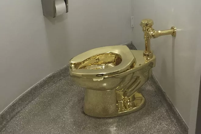file photo of fully functioning solid gold toilet made by italian artist maurizio cattelan photo afp file photo of fully functioning solid gold toilet made by italian artist maurizio cattelan photo afp