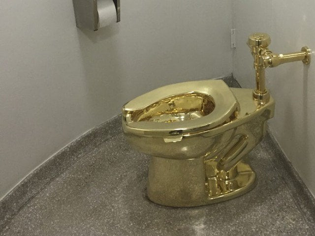 file photo of fully functioning solid gold toilet made by italian artist maurizio cattelan photo afp file file photo of fully functioning solid gold toilet made by italian artist maurizio cattelan photo afp file