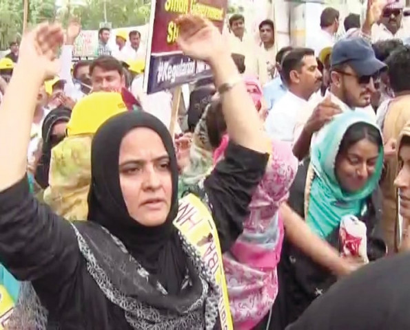 scores of teachers from public schools in karachi and other parts of the province clashed with the police on sunday as they attempted to march toward the chief minister house to register their protest against what they claimed was the government s high handedness photos express scores of teachers from public schools in karachi and other parts of the province clashed with the police on sunday as they attempted to march toward the chief minister house to register their protest against what they claimed was the government s high handedness photos express