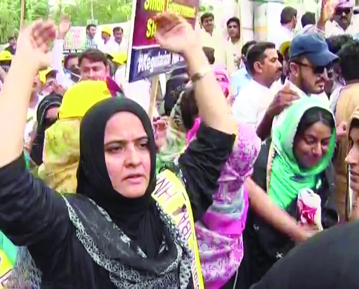 scores of teachers from public schools in karachi and other parts of the province clashed with the police on sunday as they attempted to march toward the chief minister house to register their protest against what they claimed was the government s high handedness photos express