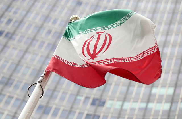 the iranian flag flutters in front the international atomic energy agency iaea headquarters in vienna austria july 10 2019 photo reuters