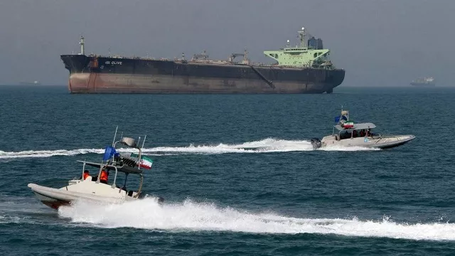 iranian revolutionary guards drive speedboats in front of an oil tanker at the port of bandar abbas in this july 2 2012 photo afp file iranian revolutionary guards drive speedboats in front of an oil tanker at the port of bandar abbas in this july 2 2012 photo afp file
