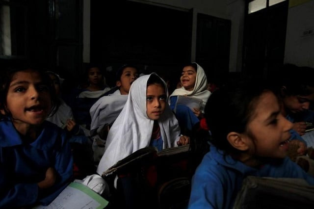 a girl attends her daily class with others at a government school in peshawar october 29 2014 photo reuters file a girl attends her daily class with others at a government school in peshawar october 29 2014 photo reuters file