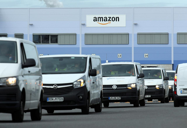 delivery vehicles leave an amazon logistics centre in mannheim germany september 17 2019 photo reuters delivery vehicles leave an amazon logistics centre in mannheim germany september 17 2019 photo reuters