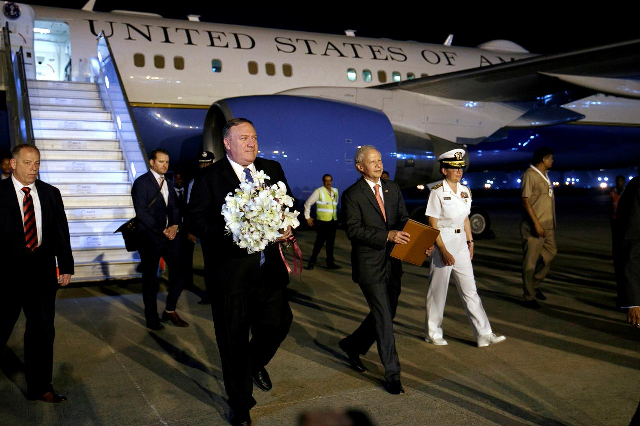 mike pompeo received in new delhi with flowers photo reuters