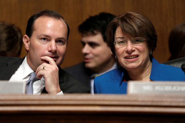 file photo chairman of the senate judiciary committee antitrust subcommittee mike lee r ut speaks with amy klobuchar d mn before a hearing in washington us december 7 2016 photo reuters