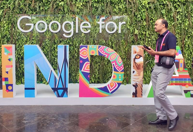 a man walks past the sign of quot google for india quot the company 039 s annual technology event in new delhi september 19 2019 photo reuters
