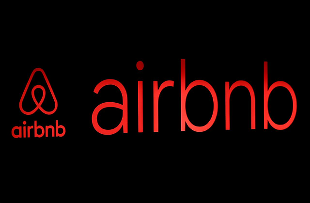 the logos of airbnb are displayed at an airbnb event in tokyo japan june 14 2018 photo reuters the logos of airbnb are displayed at an airbnb event in tokyo japan june 14 2018 photo reuters