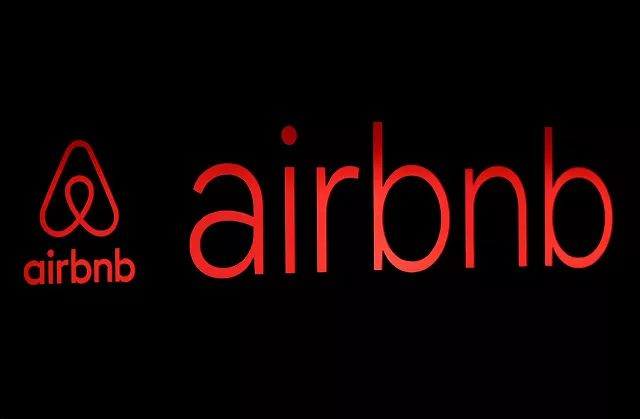the logos of airbnb are displayed at an airbnb event in tokyo japan june 14 2018 photo reuters the logos of airbnb are displayed at an airbnb event in tokyo japan june 14 2018 photo reuters