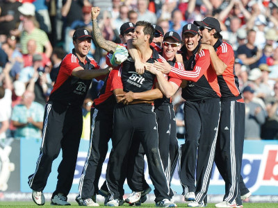 england hold nerve to clinch series