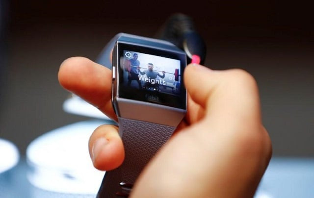 a visitor uses a fitbit ionic watch at the ifa electronics show in berlin germany september 1 2017 photo reuters a visitor uses a fitbit ionic watch at the ifa electronics show in berlin germany september 1 2017 photo reuters