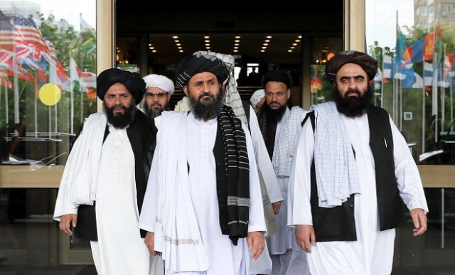 file photo of members of taliban delegation led by chief negotiator mullah abdul ghani baradar photo reuters file photo of members of taliban delegation led by chief negotiator mullah abdul ghani baradar photo reuters