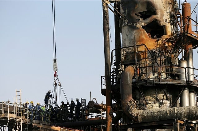 workers are seen at the damaged site of saudi aramco oil facility in abqaiq saudi arabia photo reuters file workers are seen at the damaged site of saudi aramco oil facility in abqaiq saudi arabia photo reuters file