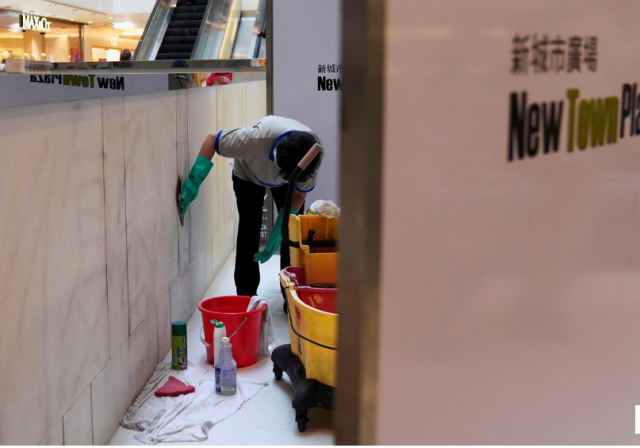 workers clean graffiti at new town plaza in sha tin hong kong china photo reuters workers clean graffiti at new town plaza in sha tin hong kong china photo reuters
