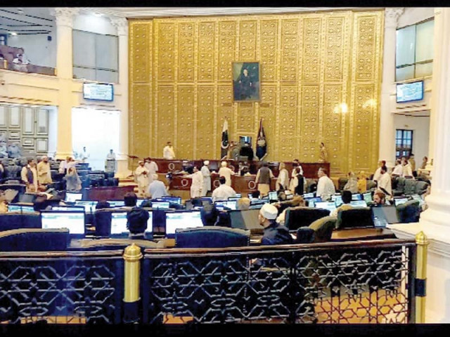 opposition members surround the speaker s chair in the house on monday photo express opposition members surround the speaker s chair in the house on monday photo express