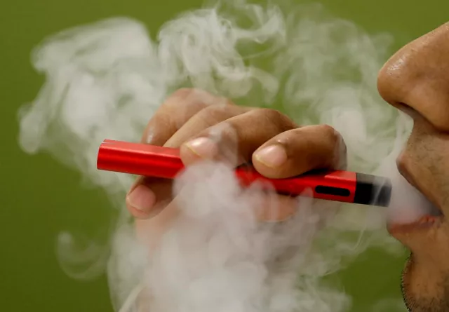 a man uses a vape device in this illustration picture photo reuters a man uses a vape device in this illustration picture photo reuters