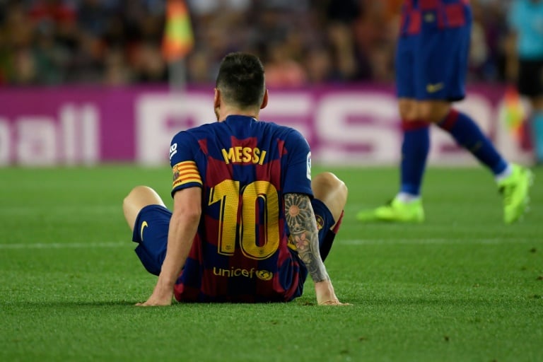 messi received treatment in the first half for what looked like a problem with his left thigh and was then unable to continue after the interval replaced by ousmane dembele photo afp