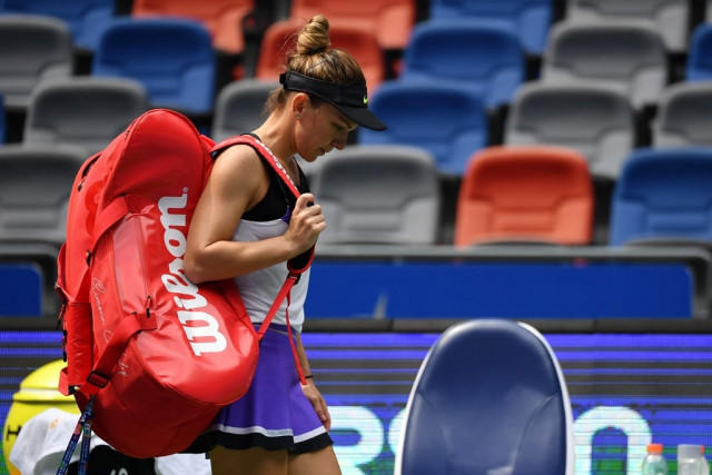 unbearable during the changeover after the ninth game halep took a medical timeout for treatment to her back but soon after she retired photo afp unbearable during the changeover after the ninth game halep took a medical timeout for treatment to her back but soon after she retired photo afp
