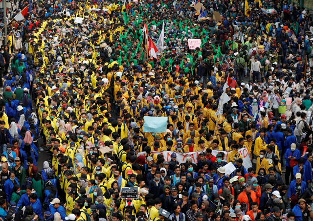 university students take part in a protest outside the indonesian parliament building in jakarta indonesia photo reuters