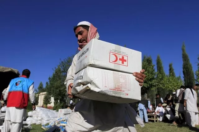 an afghan man receives aid from the international federation of the red cross and red crescent societies after an earthquake in behsud district of jalalabad province afghanistan photo reuters an afghan man receives aid from the international federation of the red cross and red crescent societies after an earthquake in behsud district of jalalabad province afghanistan photo reuters