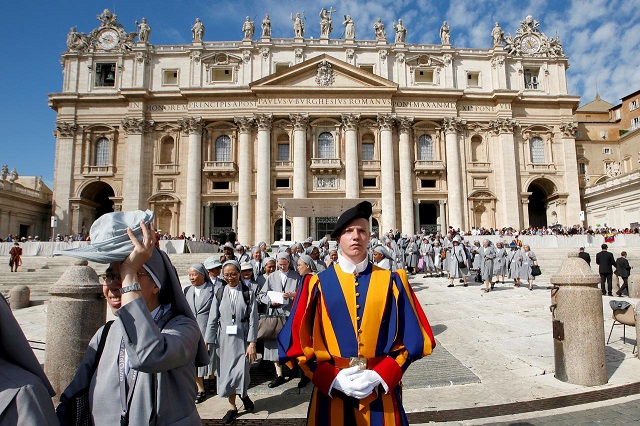 nuns walk next to a member of the swiss guard during the weekly general audience at the vatican september 25 2019 photo reuters