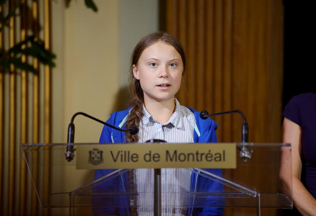 climate change teen activist greta thunberg speaks as she receives the key to the city from montreal mayor valerie plante after a climate strike march in montreal quebec canada september 27 2019 photo afp