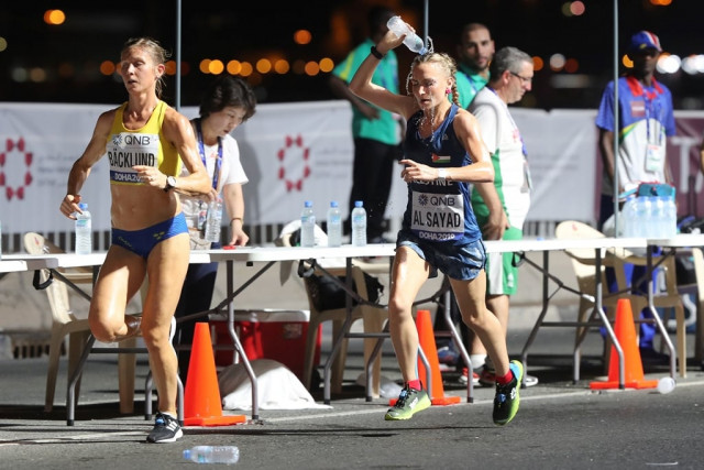 too hot to handle around two dozen runners in the 68 strong marathon field fell by the wayside as the sweltering conditions took their toll photo afp too hot to handle around two dozen runners in the 68 strong marathon field fell by the wayside as the sweltering conditions took their toll photo afp