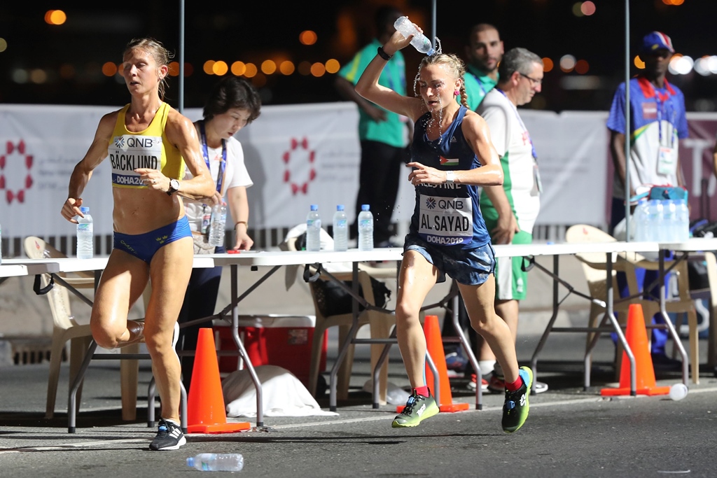 too hot to handle around two dozen runners in the 68 strong marathon field fell by the wayside as the sweltering conditions took their toll photo afp