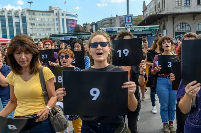 women hold signs with different numbers symbolizing the women murders during a protest against gender violence in istanbul photo afp women hold signs with different numbers symbolizing the women murders during a protest against gender violence in istanbul photo afp