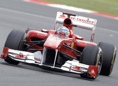 alonso gives ferrari first win of season