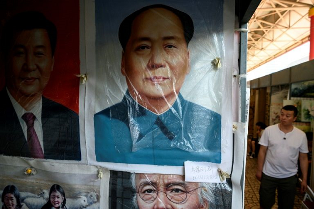 paintings of china 039 s president xi jinping and founder of the people 039 s republic mao zedong adorn the panjiayuan antique market in beijing photo afp paintings of china 039 s president xi jinping and founder of the people 039 s republic mao zedong adorn the panjiayuan antique market in beijing photo afp